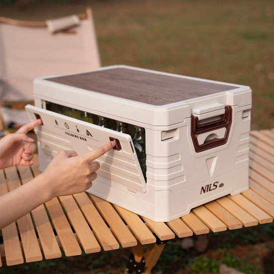 Składana skrzynia kempingowa z funkcją stołu NILS CAMP NCB4002 32L zielona